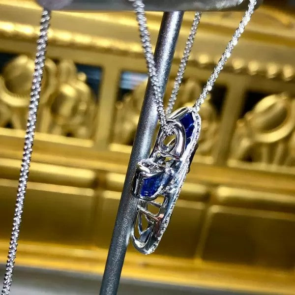 5.5ctw Baguette Cut Sapphire Cross Pendant Necklace