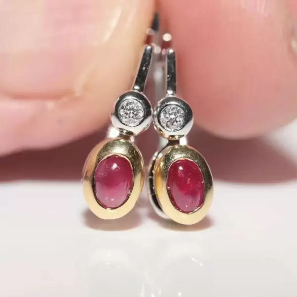 Two Tone 3ctw Oval Cut Ruby And White Sapphire Earrings
