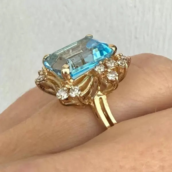 8.42ctw Emerald Cut Blue Topaz Cocktail Ring