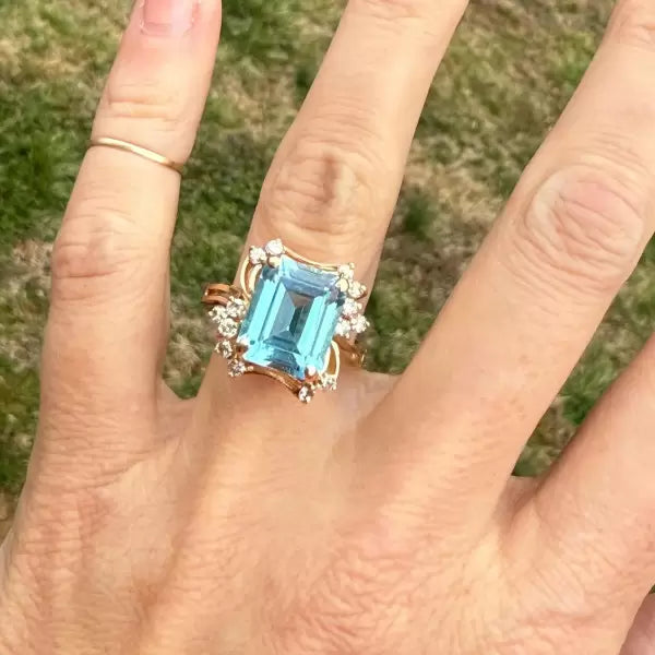 8.42ctw Emerald Cut Blue Topaz Cocktail Ring