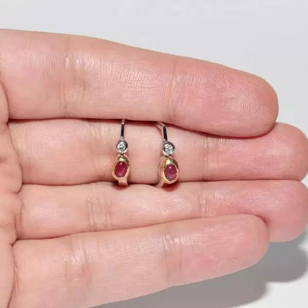 Two Tone 3ctw Oval Cut Ruby And White Sapphire Earrings