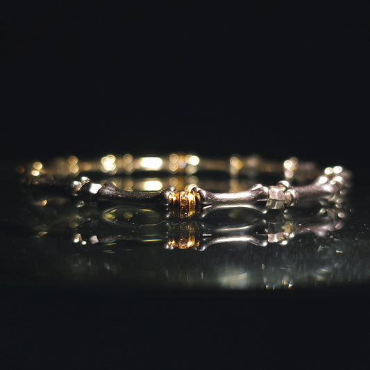 Integrity - Platinum-Plated Silver Bone with Gold-Plated Bead Bracelet (IN-250308-A)